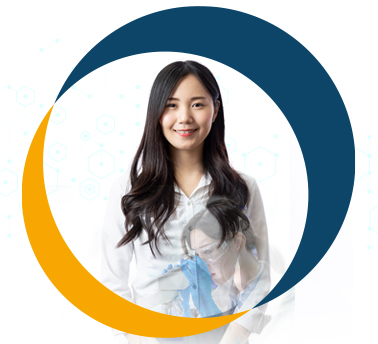 A female health sciences worker smiling confidently