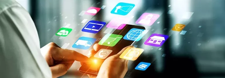 Person using a smartphone with colorful app icons floating above.