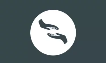 Two hands reaching towards each other in a white circle on a dark background.