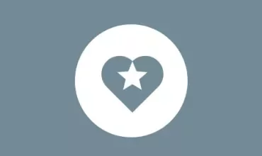 White star inside a heart on a blue background.