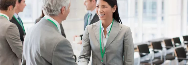woman and man shaking hands